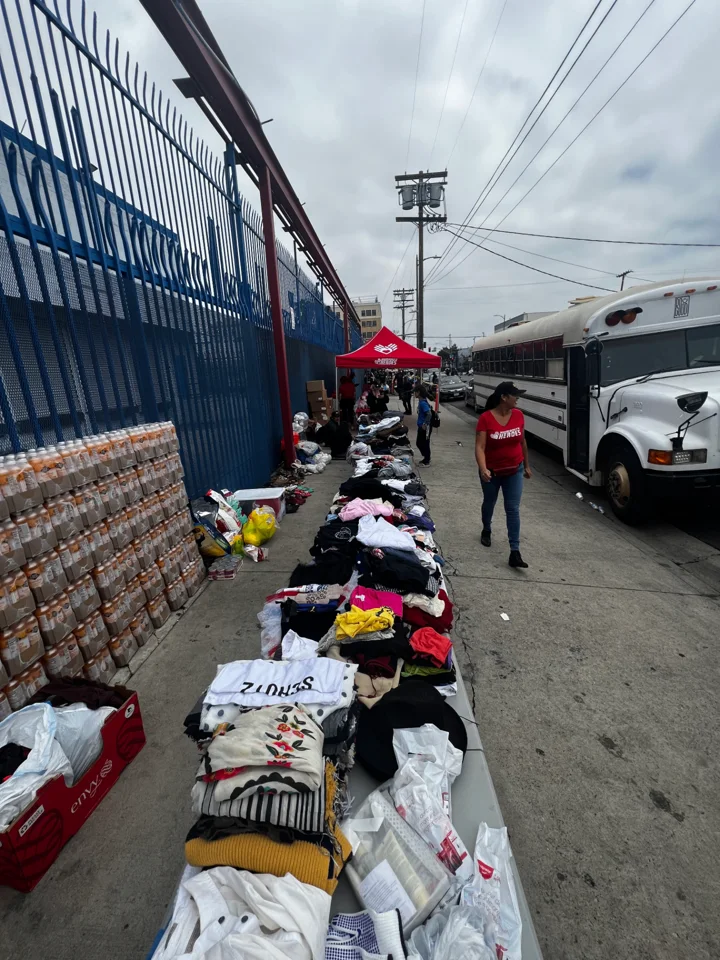DO GOOD volunteers sharing supplies during street outreach