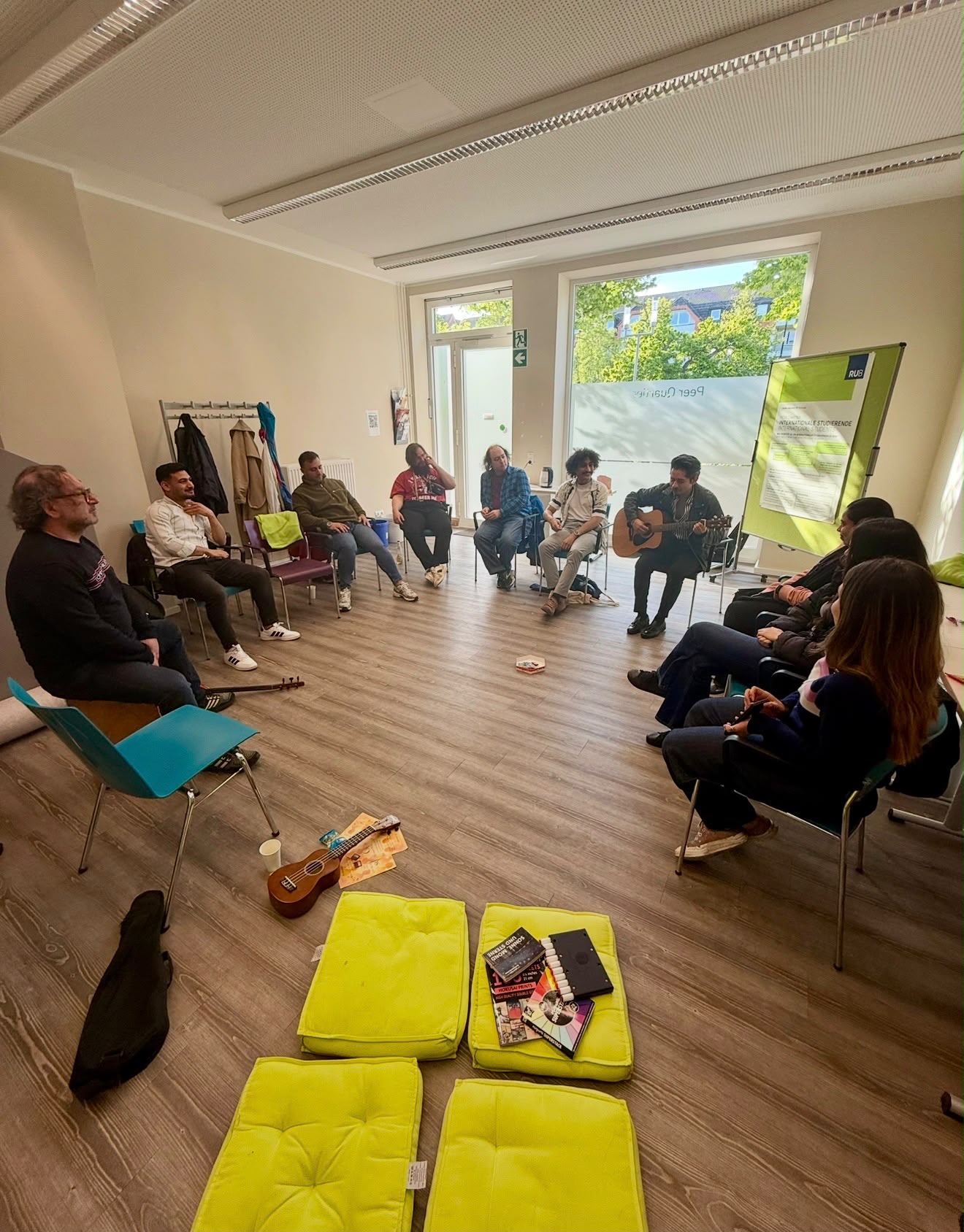 Participants sharing a community session at COS