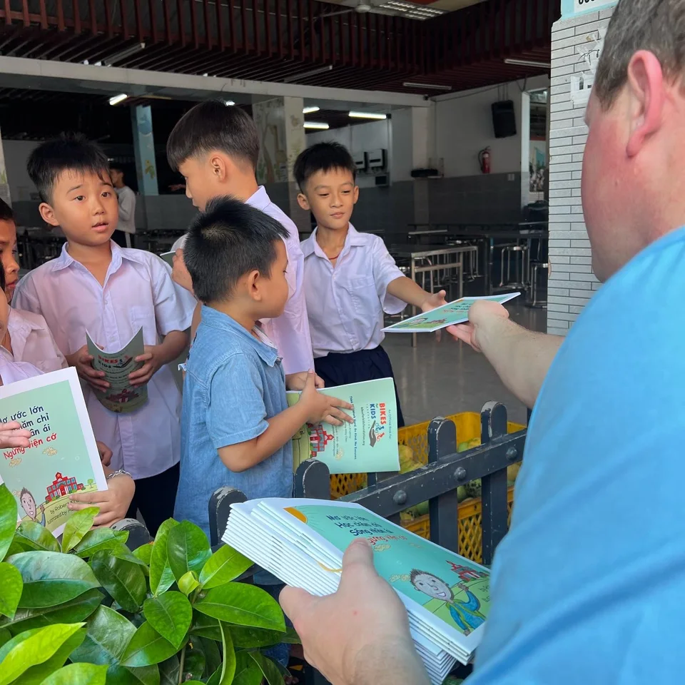 Books being shared with children at a community event